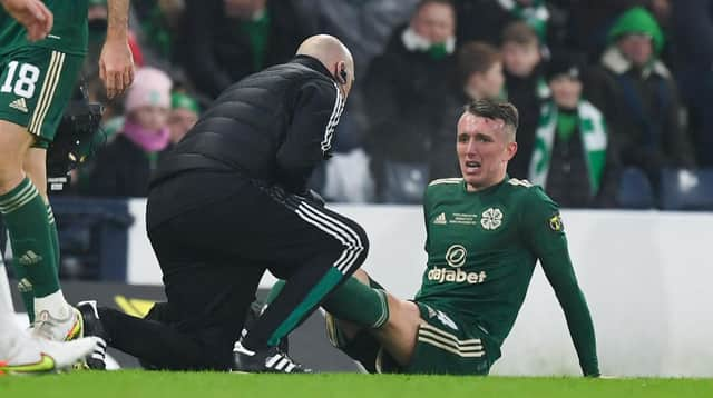 Celtic's David Turnbull shows his distress after sustaining the hamstring strain in the League Cup final little over a week ago that is likely to sideline him until March. (Photo by Craig Foy / SNS Group)