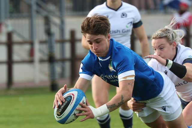 Alyssa D'Inca of Italy scores a first-half try against Scotland. Photo by David Gibson/Fotosport/Shutterstock