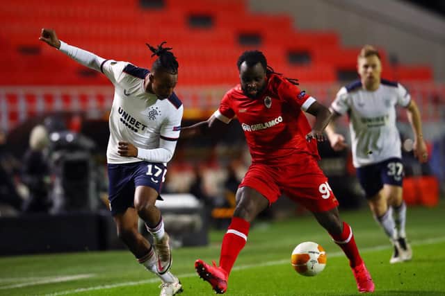 Rangers playmaker Joe Aribo battles for possession with Jordan Lukaku of Royal Antwerp during the first leg of the Europa League round of 32 tie in Belgium last week. (Photo by Dean Mouhtaropoulos/Getty Images)