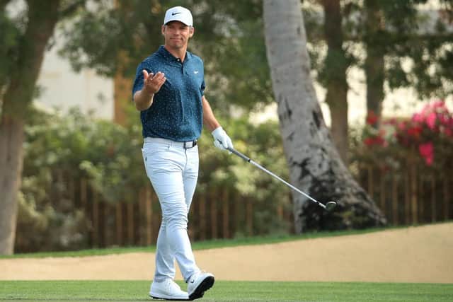 Paul Casey reacts after chipping in for birdie on the fourth during the final round of the Omega Dubai Desert Classic at Emirates Golf Club. Picture: Andrew Redington/Getty Images.