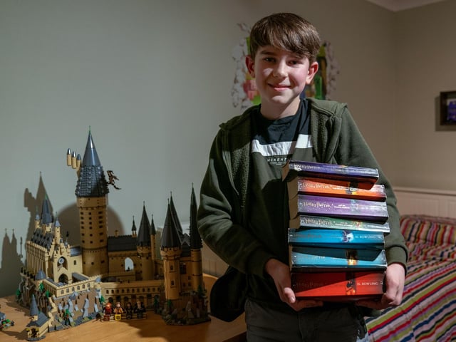 Eli Chmelik, 11, who has set the Guinness World Record for identifying the most Harry Potter characters from quotes from the Harry Potter films in one minute, at his home in Manningtree, Essex. Eli successfully identified 19 quotes. Picture date: Wednesday January 26, 2022.