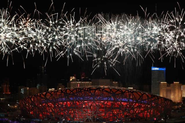 Fireworks go off over the National Stadium, known as the Bird's Nest, in Beijing, during the opening ceremony of the Beijing 2022 Winter Olympic Games, on February 4, 2022.