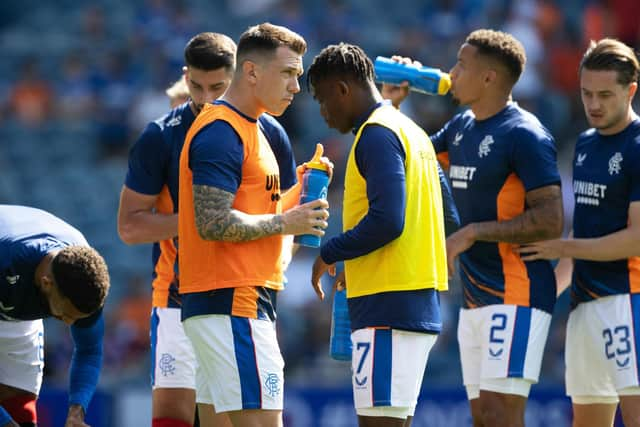 Ryan Jack and the Rangers players take on water ahead of the cinch Premiership match between Rangers and St Johnstone at sun-baked Ibrox Stadium. (Photo by Craig Williamson / SNS Group)