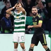 Celtic's Jota despairs over an early missed chance over Real Madrid as Karim Benzema looks on. Now the winger is pledging that Ange Postecoglou's men will learn from mistakes in the 3-0 loss. (Photo by Alan Harvey / SNS Group)