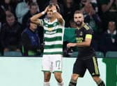Celtic's Jota despairs over an early missed chance over Real Madrid as Karim Benzema looks on. Now the winger is pledging that Ange Postecoglou's men will learn from mistakes in the 3-0 loss. (Photo by Alan Harvey / SNS Group)