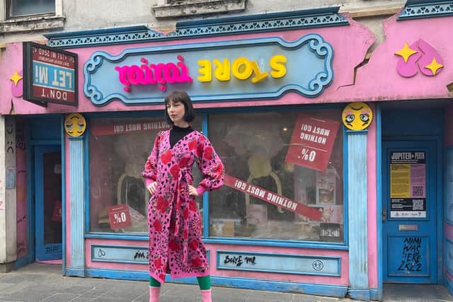 Artist Rachel Maclean has created an upside down abandoned toyshop installation for Perth High Street.