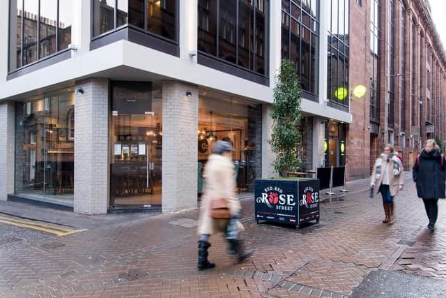 A street view of part of Hanover Buildings, which occupies a prime position on Edinburgh's Rose Street, between Hanover Street and St Andrew Square.