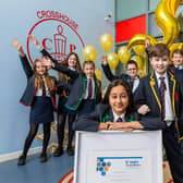 Pupils from Crosshouse Primary School, East Kilbride, celebrate accreditation for good financial education. Picture: Iain McLean