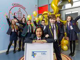Pupils from Crosshouse Primary School, East Kilbride, celebrate accreditation for good financial education. Picture: Iain McLean