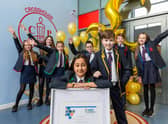 Pupils from Crosshouse Primary School, East Kilbride, celebrate accreditation for good financial education. Picture: Iain McLean