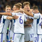 Scotland's Lewis Ferguson, Liam Cooper, Jack Hendry and Kenny McLean celebrate Billy Gilmour's goal in a recent friendly against France.