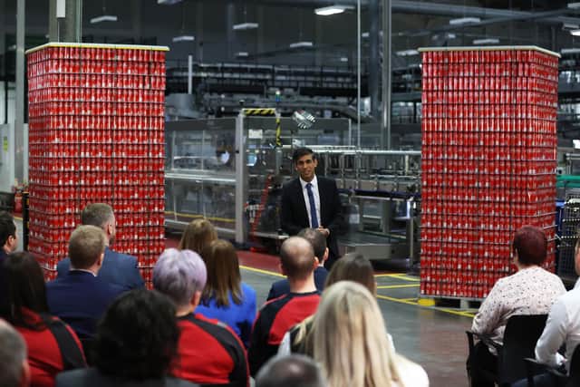 Rishi Sunak speaks to local business leaders during a visit to a Coca-Cola plant in Lisburn, Northern Ireland (Picture: Liam McBurney/WPA pool/Getty Images)