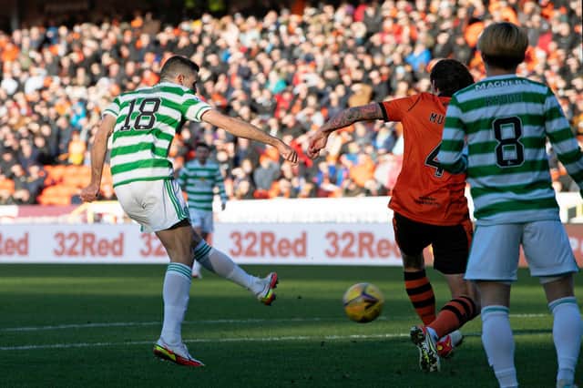 Tom Rogic opens the scoring for Celtic.