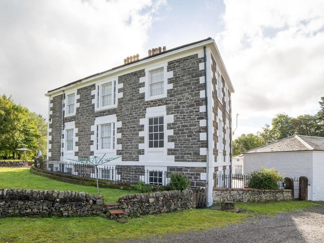 Side of property with garden.