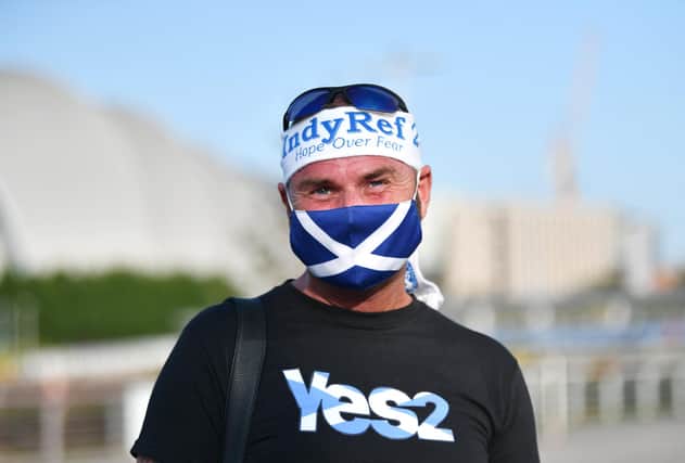 A pro-independence supporter outside the BBC Scotland HQ in Glasgow. Picture: John Devlin