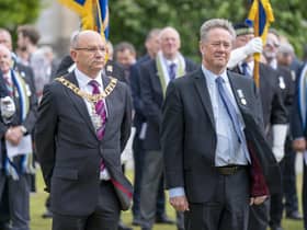 Lord Provost of the City of Edinburgh Robert Aldridge (left) joins Cabinet Secretary for Justice and Veterans Keith Brown MSP (right) and senior military personnel, as well as Falklands veterans and members of the wider armed forces community, to remember the 40th anniversary of the end of the conflict, during a parade and service of remembrance in Edinburgh. Picture date: Saturday June 18, 2022.