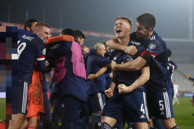 BELGRADE, SERBIA - NOVEMBER 12: Scott McTominay of Scotland and Declan Gallagher of Scotland celebrate after the UEFA EURO 2020 Play-Off Final between Serbia and Scotland at Rajko Mitic Stadium on November 12, 2020 in Belgrade, Serbia. Football Stadiums around Europe remain empty due to the Coronavirus Pandemic as Government social distancing laws prohibit fans inside venues resulting in fixtures being played behind closed doors. (Photo by Srdjan Stevanovic/Getty Images)