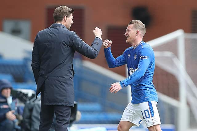 Rangers manager Steven Gerrard celebrates with Steven Davis at full-time at Ibrox on Sunday. The Northern Ireland midfielder has been a pivotal figure for the Premiership title winners this season. (Photo by Ian MacNicol/Getty Images)