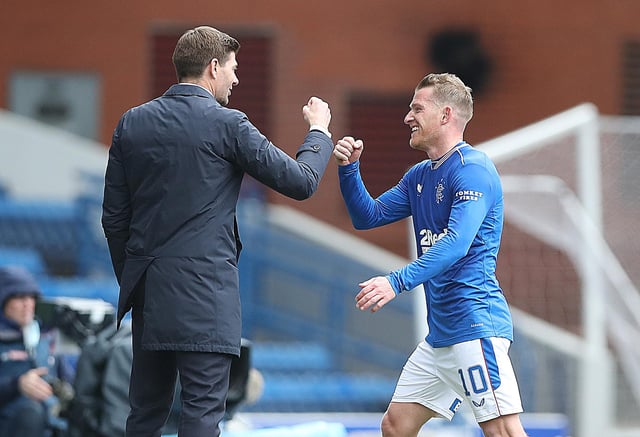 Rangers manager Steven Gerrard celebrates with Steven Davis at full-time at Ibrox on Sunday. The Northern Ireland midfielder has been a pivotal figure for the Premiership title winners this season. (Photo by Ian MacNicol/Getty Images)