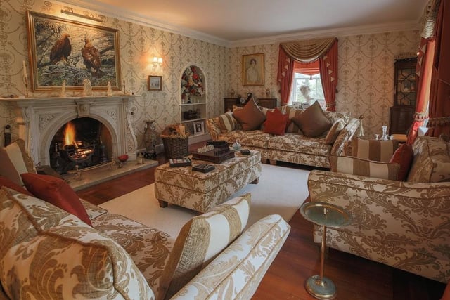 The house holds a large reception hall, three reception rooms and study, a master bedroom suite, four further bedrooms, one with an ensuite, and three bathrooms