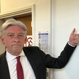 Richard Leonard MSP beside plaque commemorating John Swinney opening Haven Products factory in 2015.