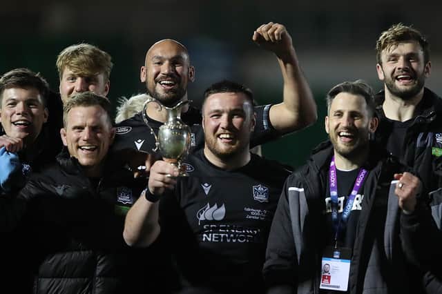 Zander Fagerson, on his 100th appearance for Glasgow Warriors, with the 1872 Cup after the win over Edinburgh at Scotstoun. Picture: Ian MacNicol/Getty Images