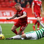 Aberdeen's Jonny Hayes is tackled by Celtic's Callum McGregor in the club's 2-1 defeat on Sunday and believes, in time, they will tackle the desperate form issues scarring the early months of the Stephen Glass era. (Photo by Craig Williamson / SNS Group)