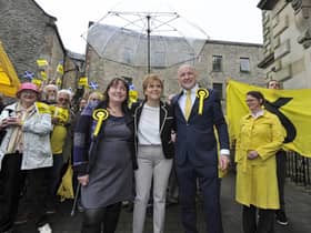 Gaily Hendry (far left) pictured with First Minister Nicola Sturgeon and Calum Kerr (far right) in Hawick. Picture: JPI Media