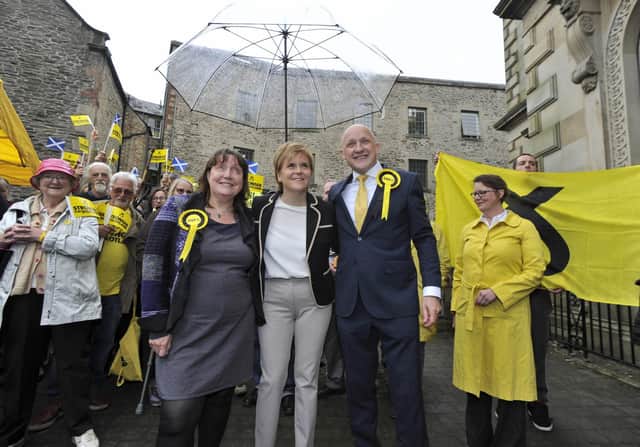 Gaily Hendry (far left) pictured with First Minister Nicola Sturgeon and Calum Kerr (far right) in Hawick. Picture: JPI Media