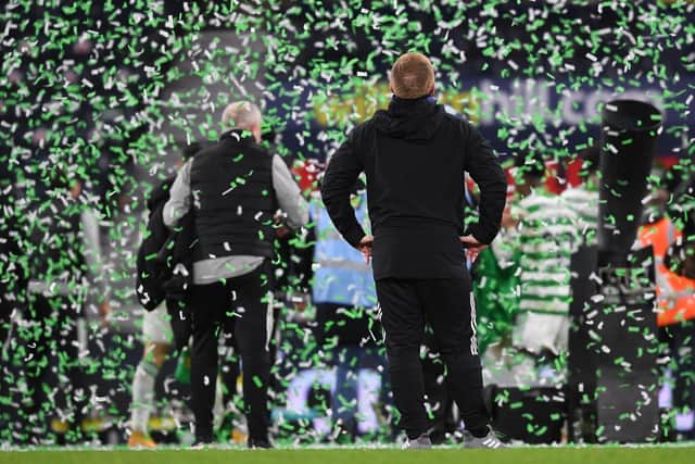 Neil Lennon soaks up the celebrations following Celtic's Scottish Cup final shoot-out success. They came at the end of a fraught afternoon and allowed the team and their manager to claim historic places in Scottish football's record books with a quadruple treble that ensured the Irishman is the first man to claim a treble both a s player and manager. (Photo by Craig Foy / SNS Group)