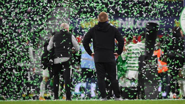 Neil Lennon soaks up the celebrations following Celtic's Scottish Cup final shoot-out success. They came at the end of  a fraught afternoon and allowed the team and their manager to claim historic places in Scottish football's record books with a quadruple treble that ensured the Irishman is the first man to claim a treble both a s player and manager. (Photo by Craig Foy / SNS Group)