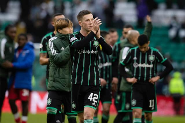 Celtic's Callum McGregor takes the acclaim of the fans at full time.
