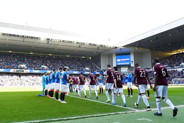 Rangers giving Hearts a guard of honour after the Tynecastle side won the Championship title in 2015. Picture: SNS