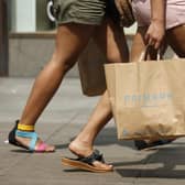 June's generally sunny weather and pre-holiday spending meant that clothing and footwear proved to be the star performing area of the non-food category last month. Jonathan Brady/PA