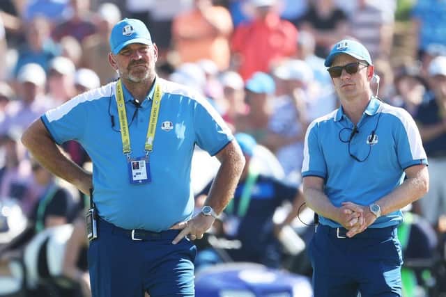 Thomas Bjorn, one of the vice-captains, and captain Luke Donald look on during last week's Ryder Cup in Rome. Picture: Jamie Squire/Getty Images.