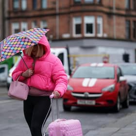 Isla Bryson, 31, formerly known as Adam Graham, from Clydebank, West Dunbartonshire, arrives at the High Court in Glasgow
