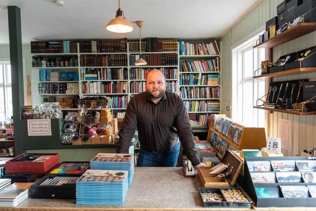 Eyþór Jóvinsson, owner of the Old Bookstore in Flateyri, which only sells items from brands who’ve been trading for more than 100 years. Pic: PA Photo/Renato Granieri.