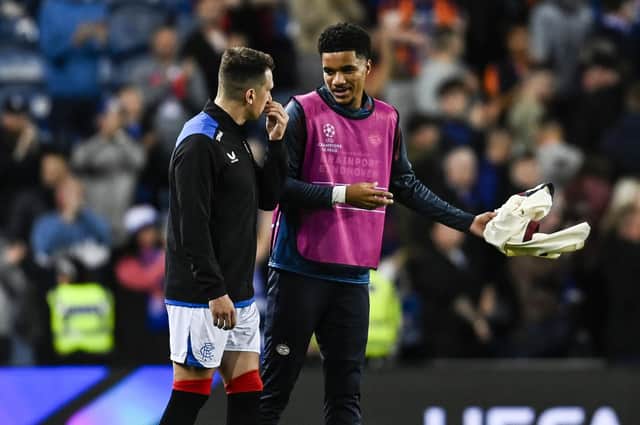 PSV's on-loan Malik Tillman talks to former Rangers teammate Ryan Jack at Ibrox last night after the 2-2 draw. Tillman was an unused sub   (Photo by Rob Casey / SNS Group)