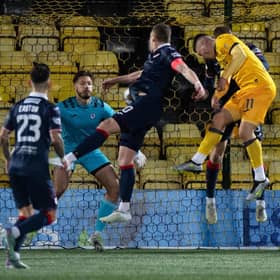 Livingston's Dan Mackay heads home his side's winner against Raith Rovers in the Scottish Cup fourth round.  (Photo by Sammy Turner / SNS Group)