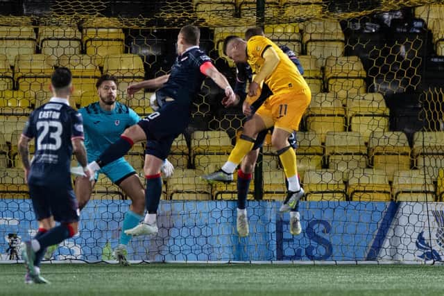 Livingston's Dan Mackay heads home his side's winner against Raith Rovers in the Scottish Cup fourth round. (Photo by Sammy Turner / SNS Group)