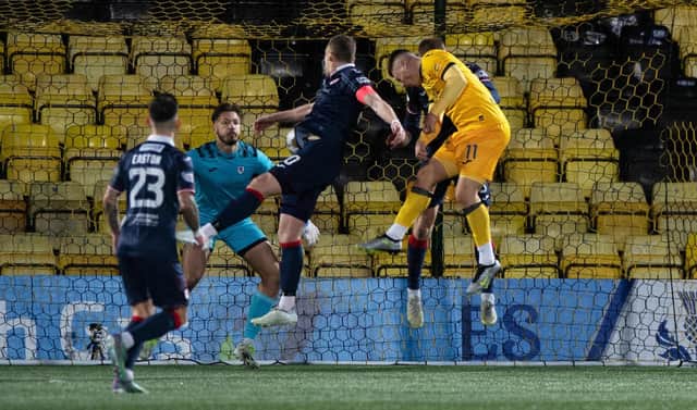 Livingston's Dan Mackay heads home his side's winner against Raith Rovers in the Scottish Cup fourth round.  (Photo by Sammy Turner / SNS Group)