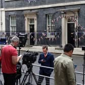 Members of the media outside 10 Downing Street on Monday (Picture: Hollie Adams/AFP)