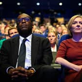 The then Chancellor Kwasi Kwarteng and Prime Minister Liz Truss at last year's Conservative party conference, when the Tories were more than 30 points behind Labour in the polls (Picture: Leon Neal/Getty Images)