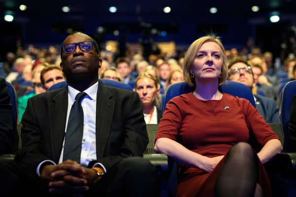 The then Chancellor Kwasi Kwarteng and Prime Minister Liz Truss at last year's Conservative party conference, when the Tories were more than 30 points behind Labour in the polls (Picture: Leon Neal/Getty Images)