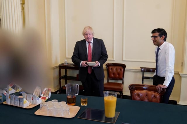 Rishi Sunak is pictured with Boris Johnson on June 19th, 2020 during the gathering for the PM's birthday.