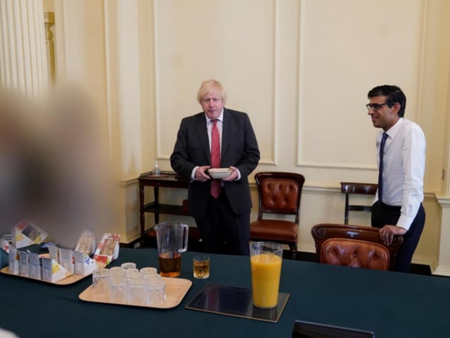Rishi Sunak is pictured with Boris Johnson on June 19th, 2020 during the gathering for the PM's birthday.