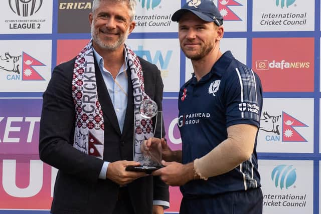 Richie Berrington receives the trophy. Pic: Ian Jacobs