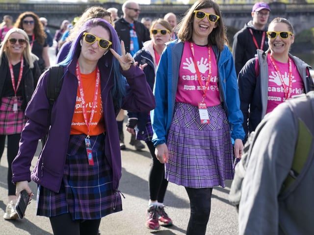 In fine spirits, the walkers head off ...