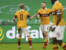Motherwell's Allan Campbell celebrates a goal with Robbie Crawford during their side's Scottish Premiership match against Celtic on Saturday, February 6 , 2021. Photo: Steve Welsh. 