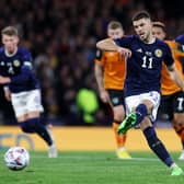 Ryan Christie confidently converts his penalty to give Scotland a 2-1 lead over Republic of Ireland.